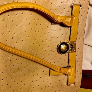 Two pocketbooks slightly used, Selling both for $40.00. They were $45.00 each.